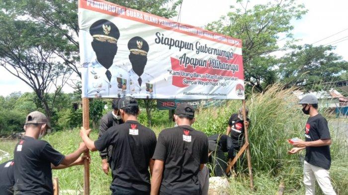 Pelaksanaan PSU di Binuang Usai, Laskar Macan Asia (LMA) Tapin Sebar Puluhan Spanduk